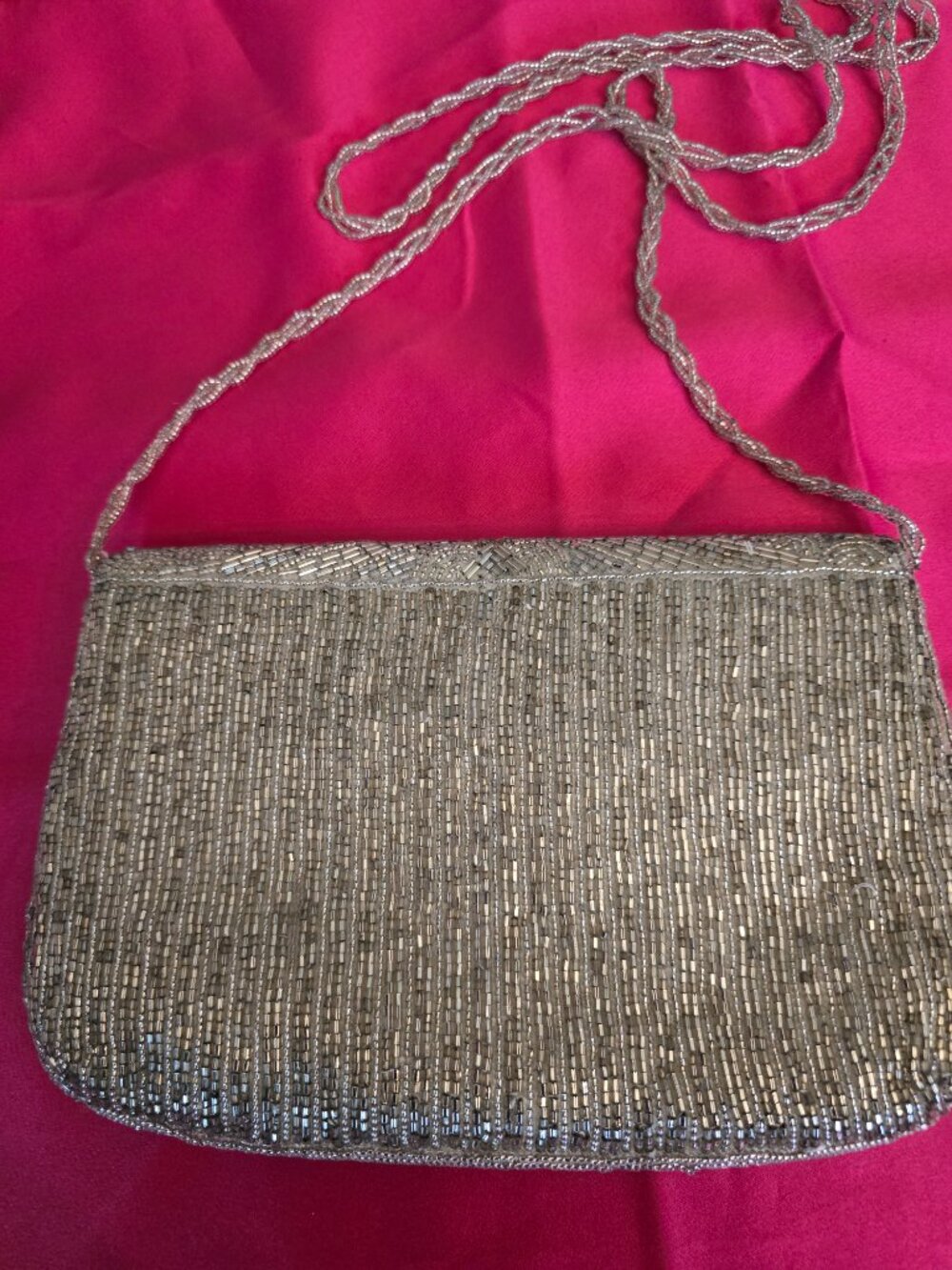 Vintage styled Silver toned beaded clutch by La Ragale